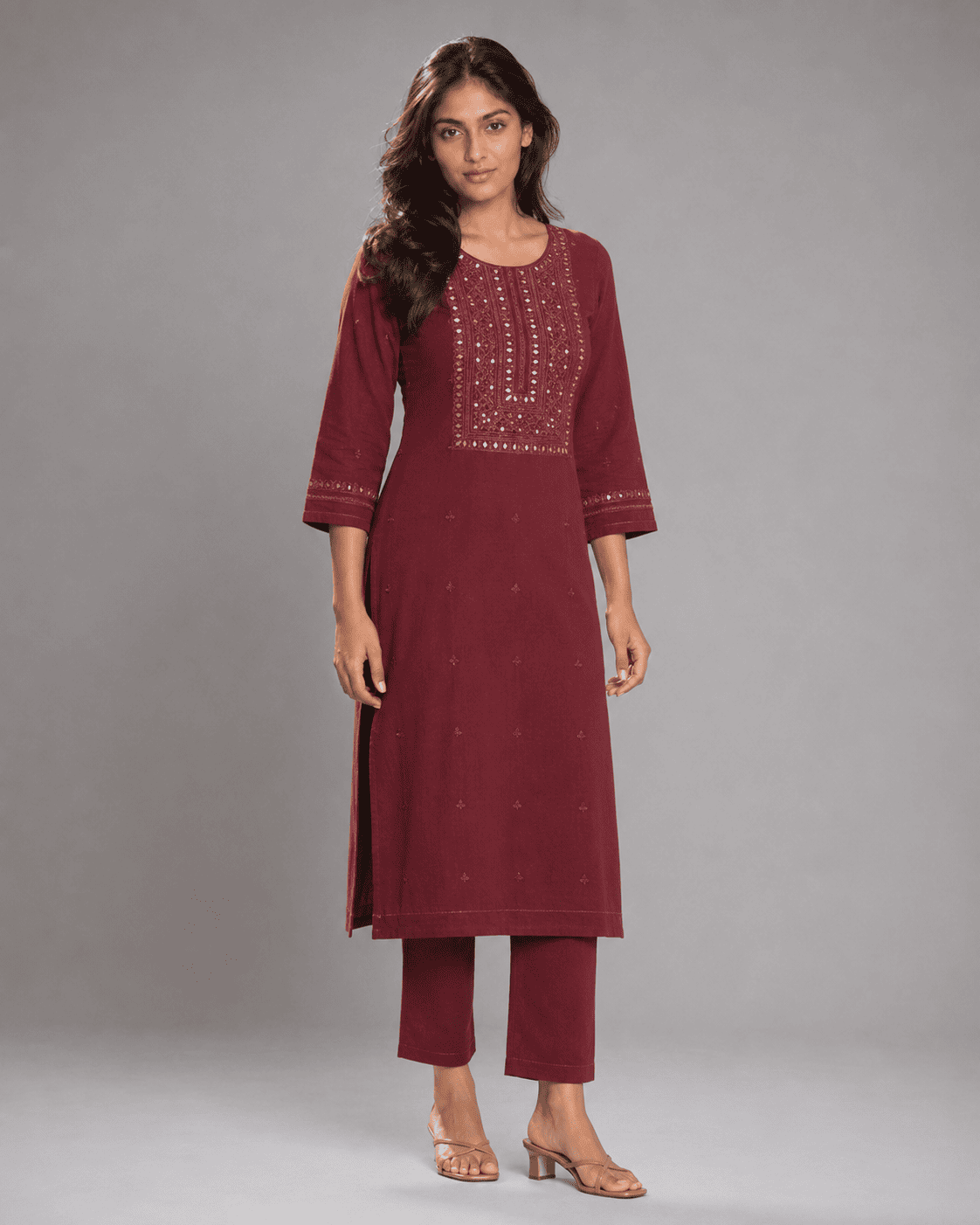 Anaya wearing a maroon embroidered kurti