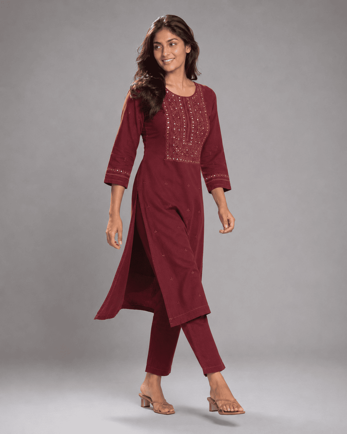 Anaya walking in the maroon kurti, lifestyle shot