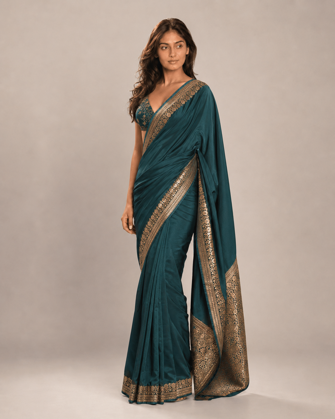 Anaya wearing a teal Banarasi silk saree, side view